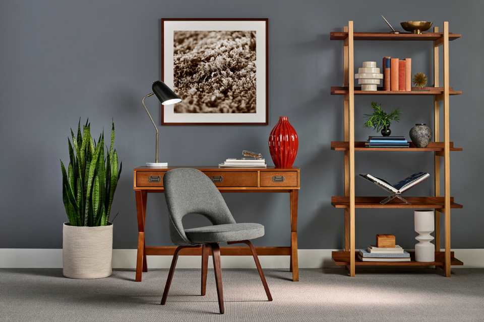 home office with wall painted gray and beige carpet